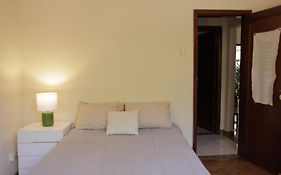 Quarto Casal com Varanda Casa Caramel